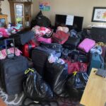 Room filled with donated suitcases.