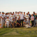 Hadley with the Peoria Panthers team on a baseball field.