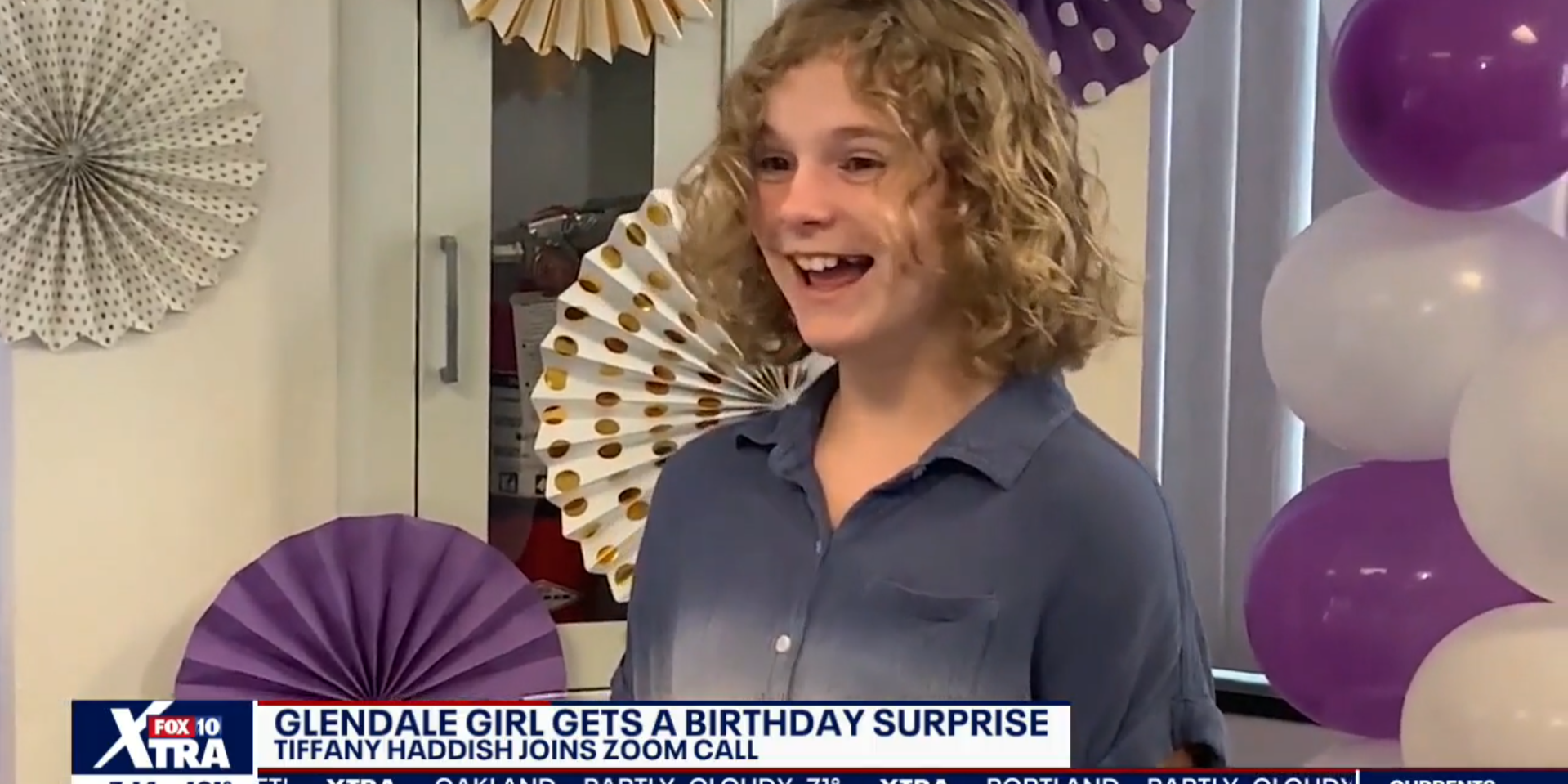 Hadley on the news, smiling. A news banner across the bottom of the screen reads "Glendale Girl Gets a Birthday Surprise: Tiffany Haddish Joins Zoom Call"